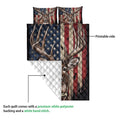 Deer hunting quilt blanket detail showing the printed antler design and quilted backing