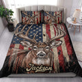 Deer hunting quilt bedding styled in a bright bedroom with bold rustic patriotic artwork
