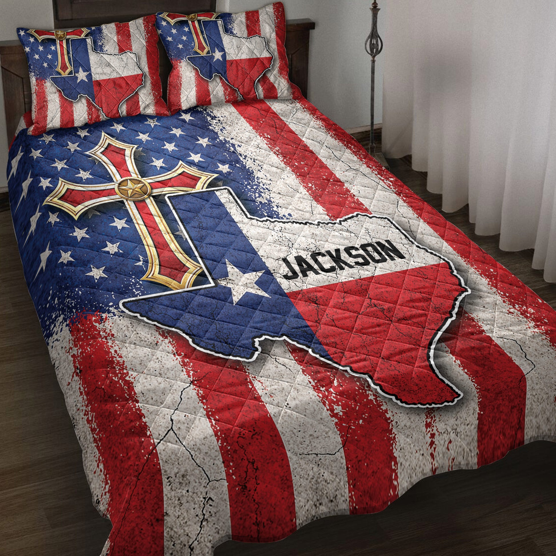 Texas quilt blanket displayed on a bed with distressed red, white, and blue stripes, stars, and Lone Star artwork