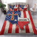 Texas quilt blanket styled in a bright bedroom with matching patriotic Texas artwork across the bed
