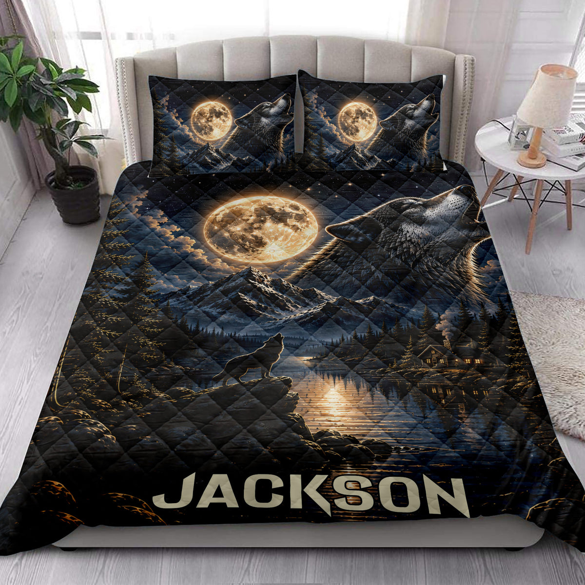 Wolf quilt bedding set styled on a bed with howling wolves, full moon, mountains, and lake scenery