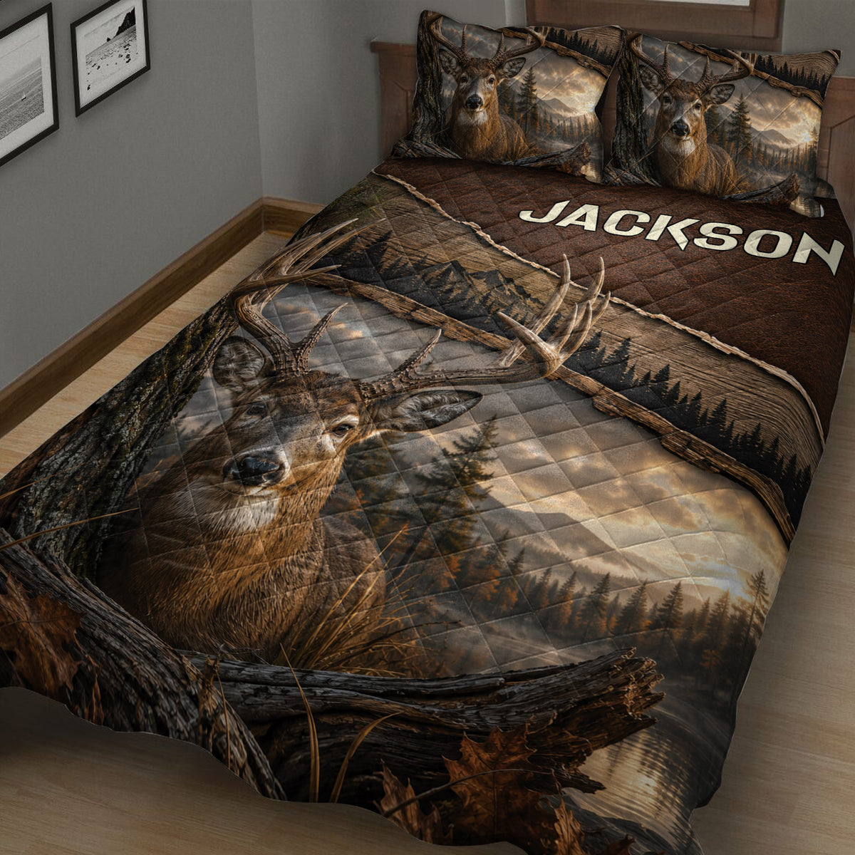 Close bedroom view of a deer quilt blanket featuring a realistic buck, antlers, trees, and rustic woodland artwork