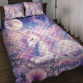 Unicorn quilt blanket spread across a bed with pastel flowers, stars, moonlight, and dreamy galaxy artwork