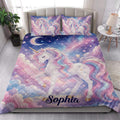 Dreamy unicorn quilt bedding styled in a bright bedroom with pastel clouds, stars, and rainbow manes