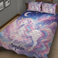 Close bedroom view of a pastel unicorn quilt blanket with moonlit sky, stars, clouds, and colorful manes