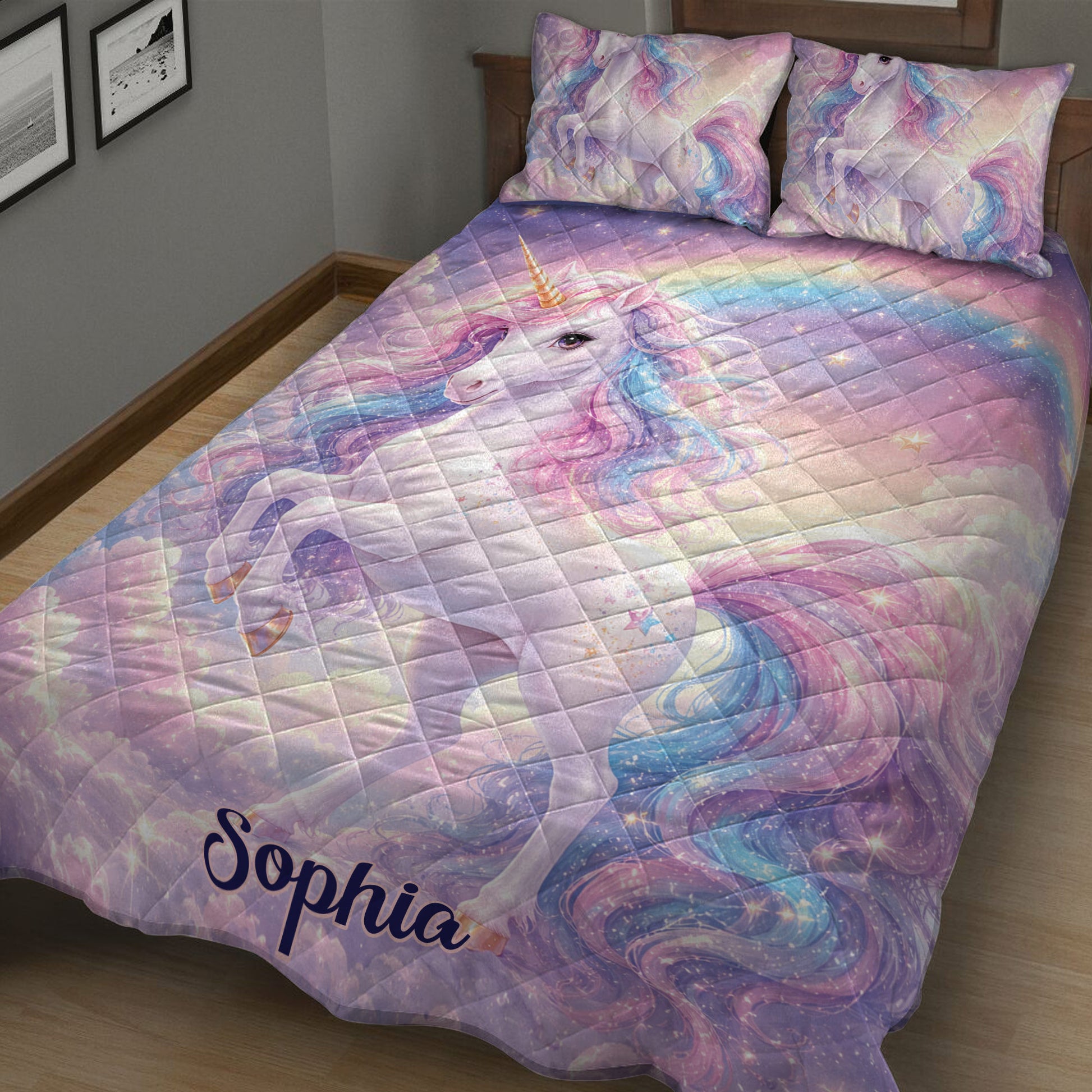 Angled bedroom view of a pastel unicorn quilt blanket with stars and flowing rainbow mane