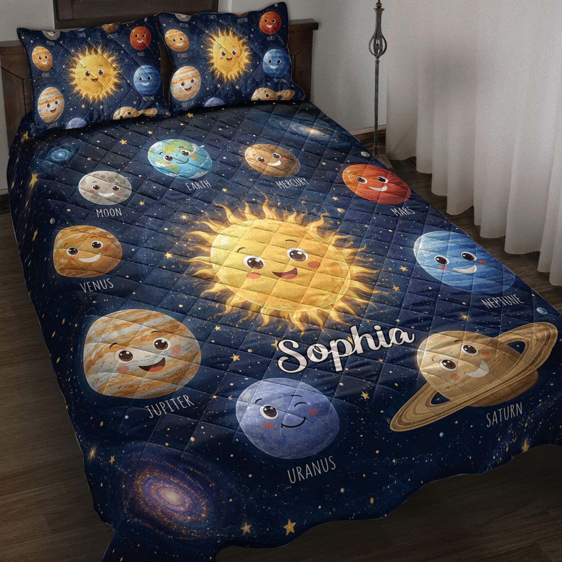 Astronaut-themed quilt blanket featuring smiling planets, stars, galaxies, and a sunny solar system bedroom design