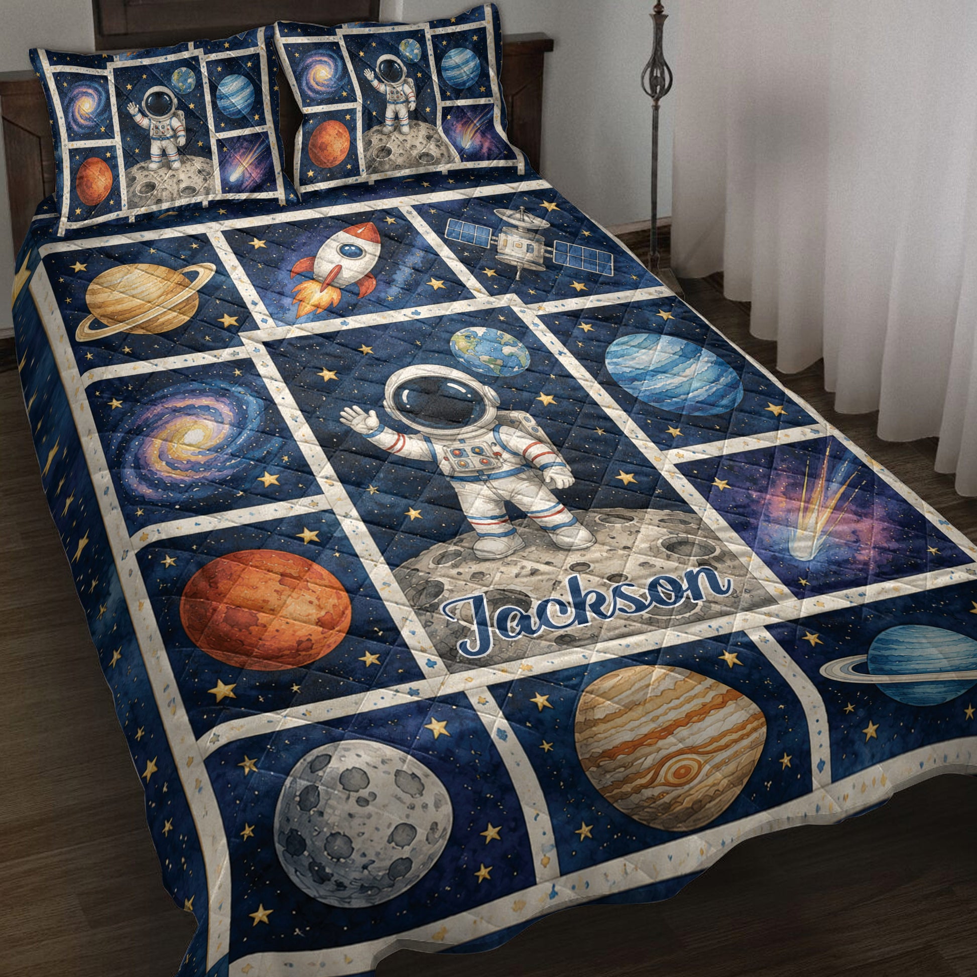 Astronaut quilt blanket spread across a bed with planets, rockets, stars, galaxies, and space artwork