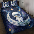 Astronaut quilt bedding set displayed on a bed with moons, stars, rockets, and deep blue space artwork