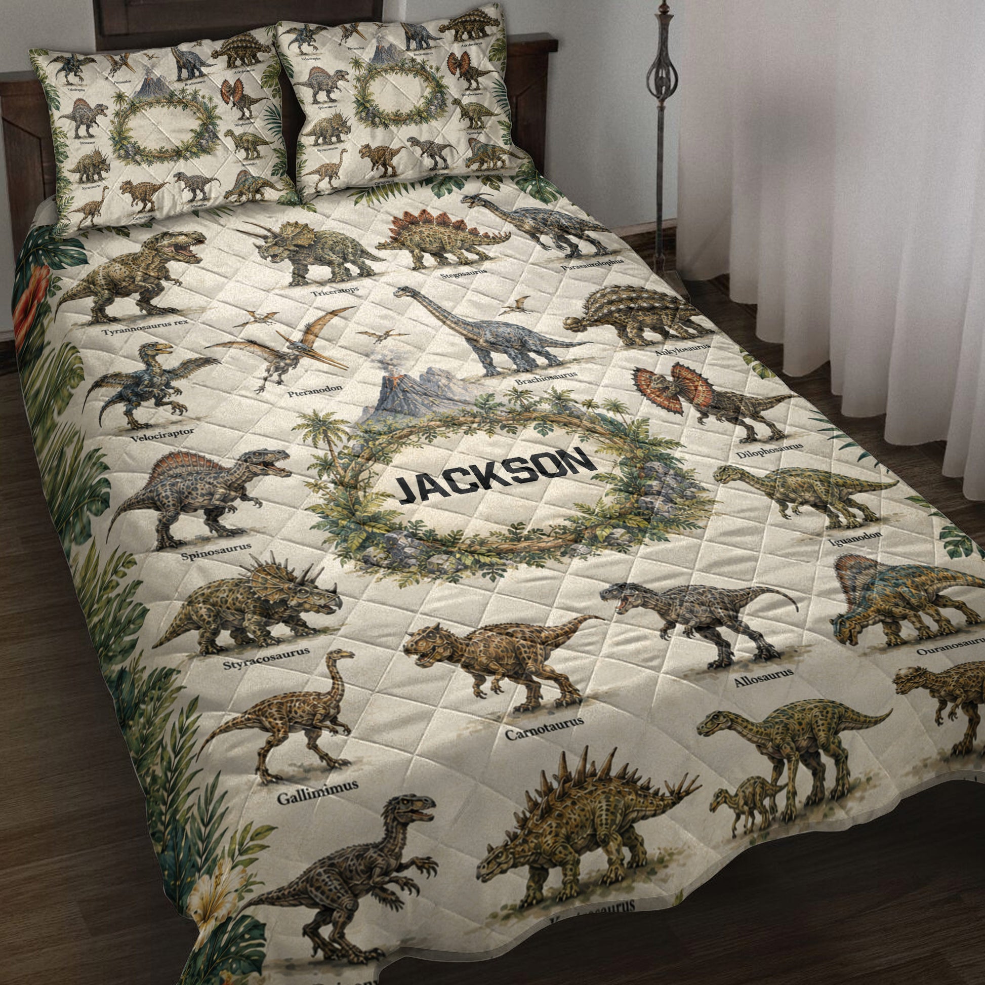 Dinosaur quilt blanket displayed on a bed with realistic prehistoric animals, tropical foliage, and a framed central design