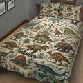 Close bedroom view of a dinosaur quilt blanket featuring realistic dinosaurs, tropical plants, flowers, and ocean artwork