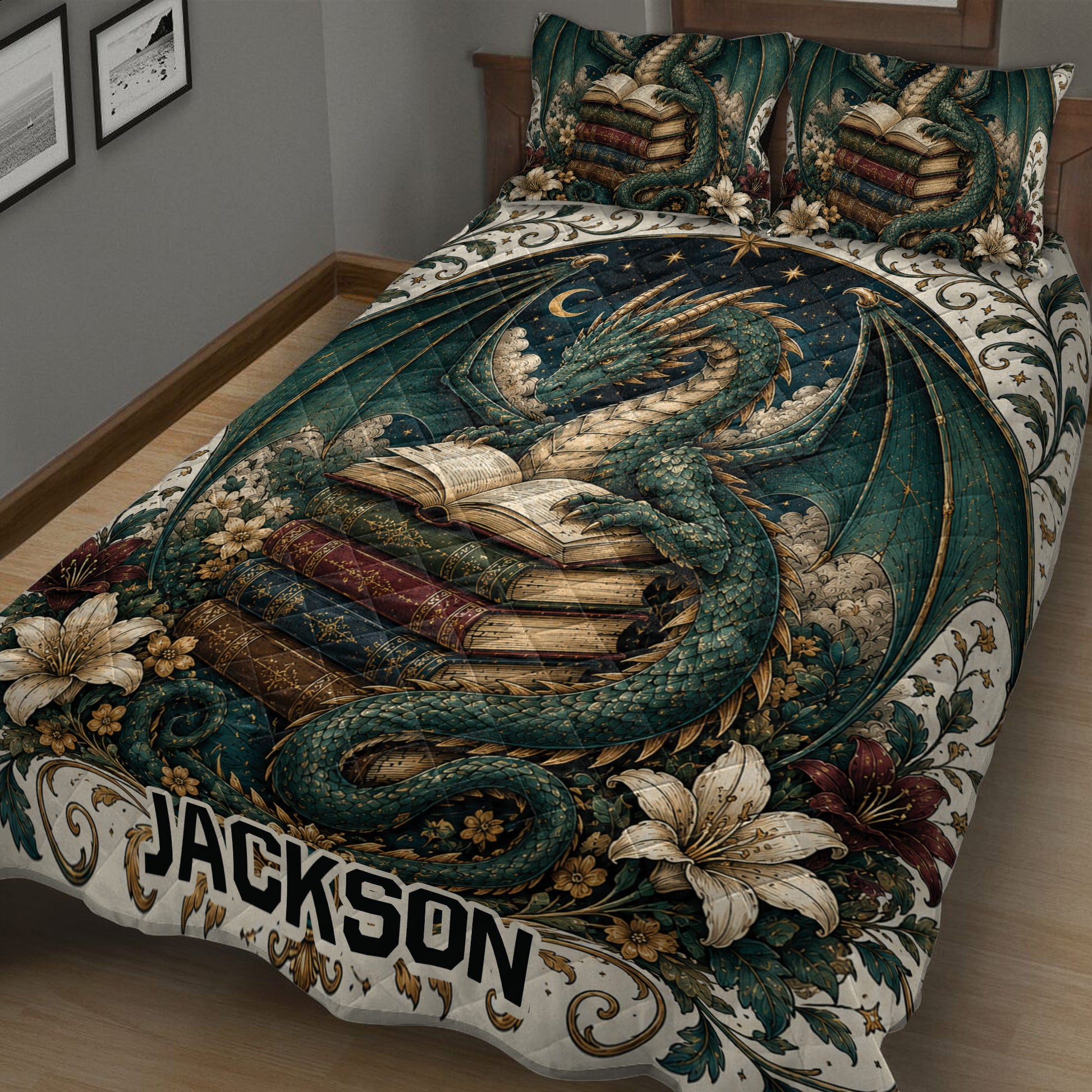 Close bedroom view of a teal fantasy dragon quilt blanket surrounded by books, stars, and flowers