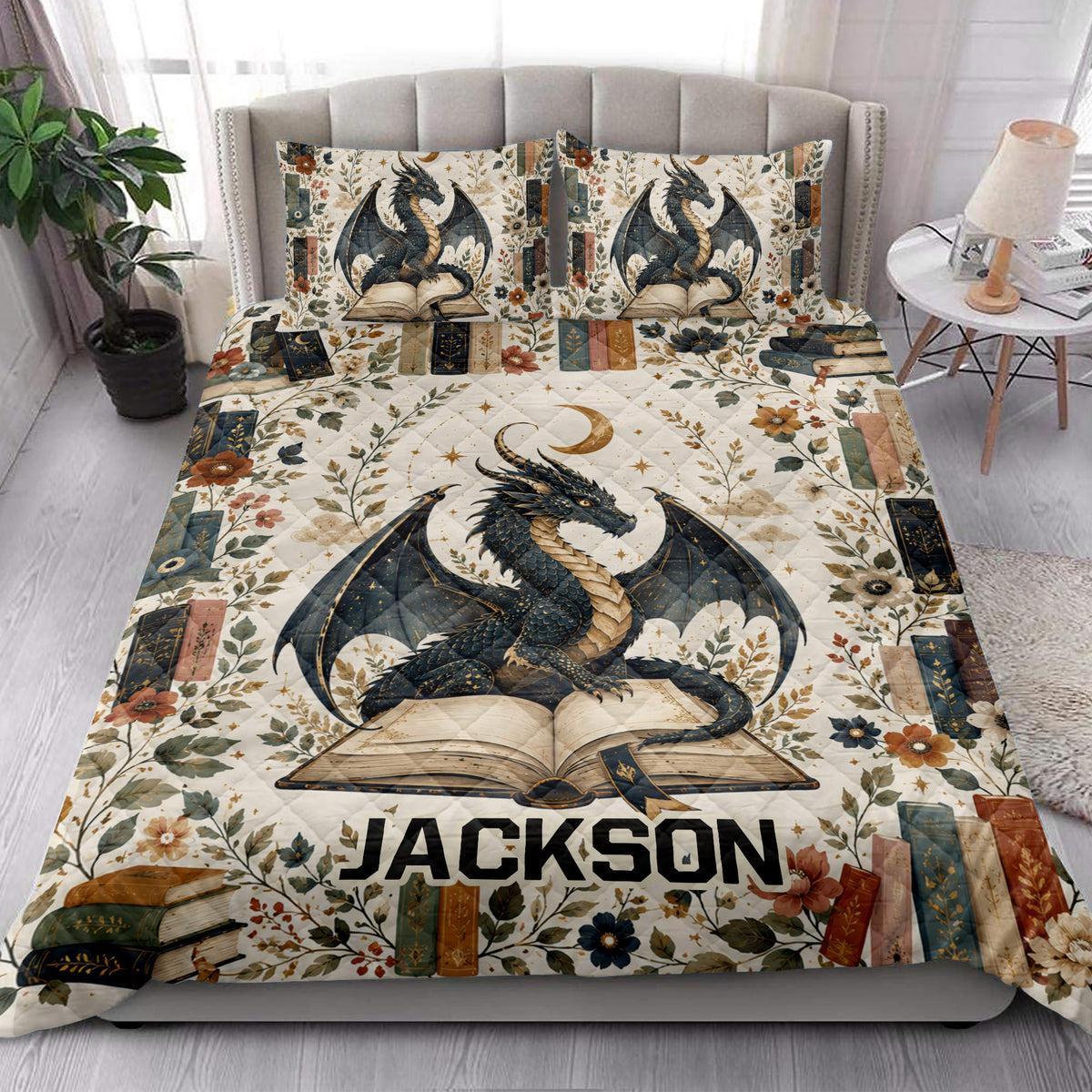 Fantasy dragon quilt blanket styled in a bright bedroom with floral book artwork