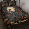 Dragon quilt blanket displayed on a bed with moonlit artwork, flowers, stars, and dark fantasy colors
