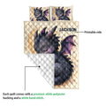Dragon quilt showing the printed artwork side and white quilted reverse side