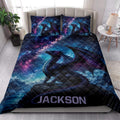 Galaxy dragon quilt blanket styled across a bedroom with matching dragon-themed pillow covers
