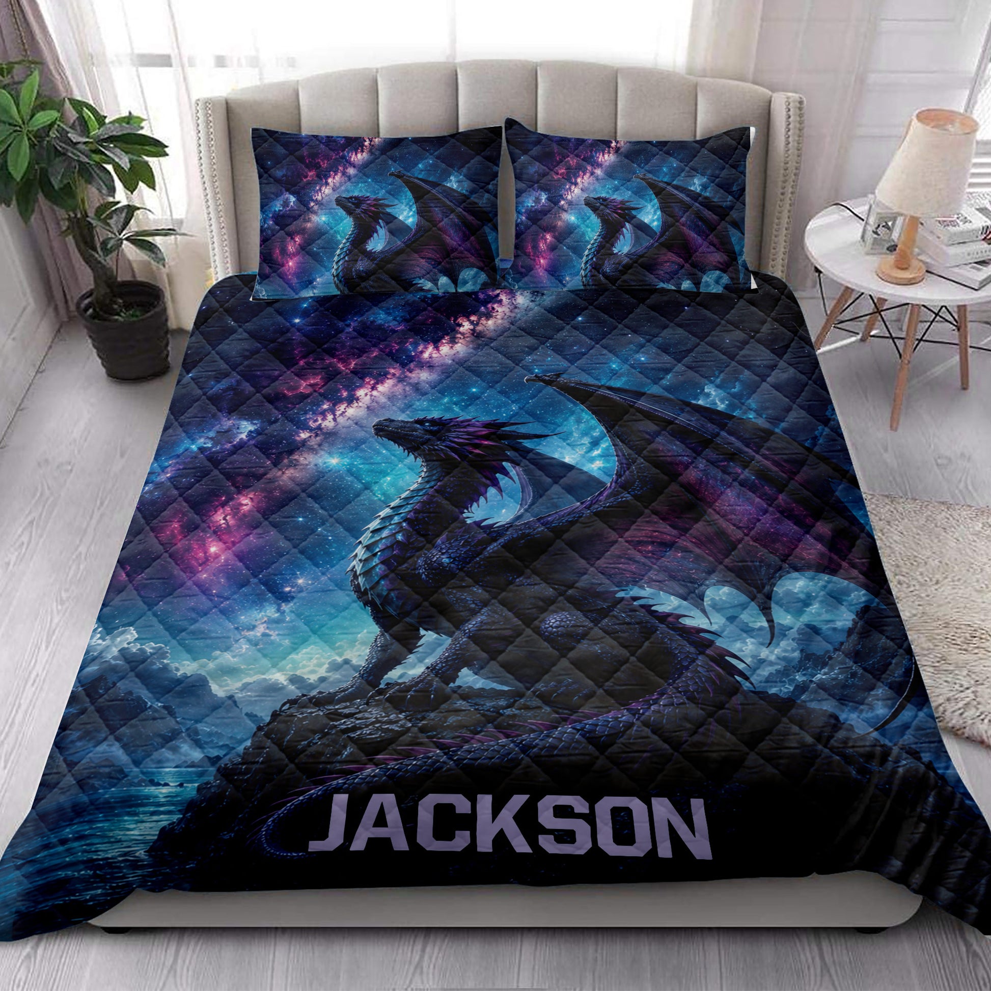Galaxy dragon quilt blanket styled across a bedroom with matching dragon-themed pillow covers
