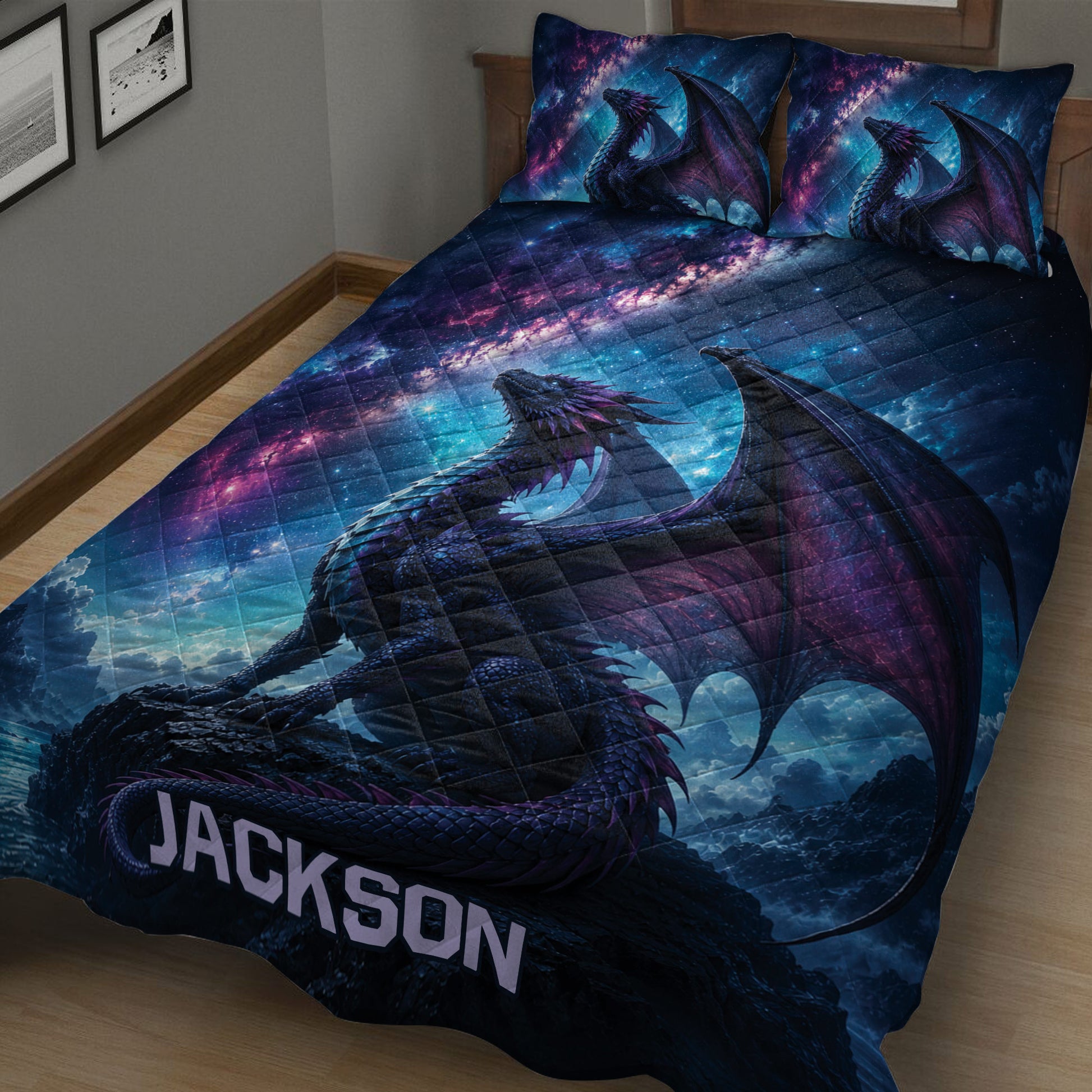 Close view of a dark fantasy dragon quilt blanket with purple wings and cosmic star artwork