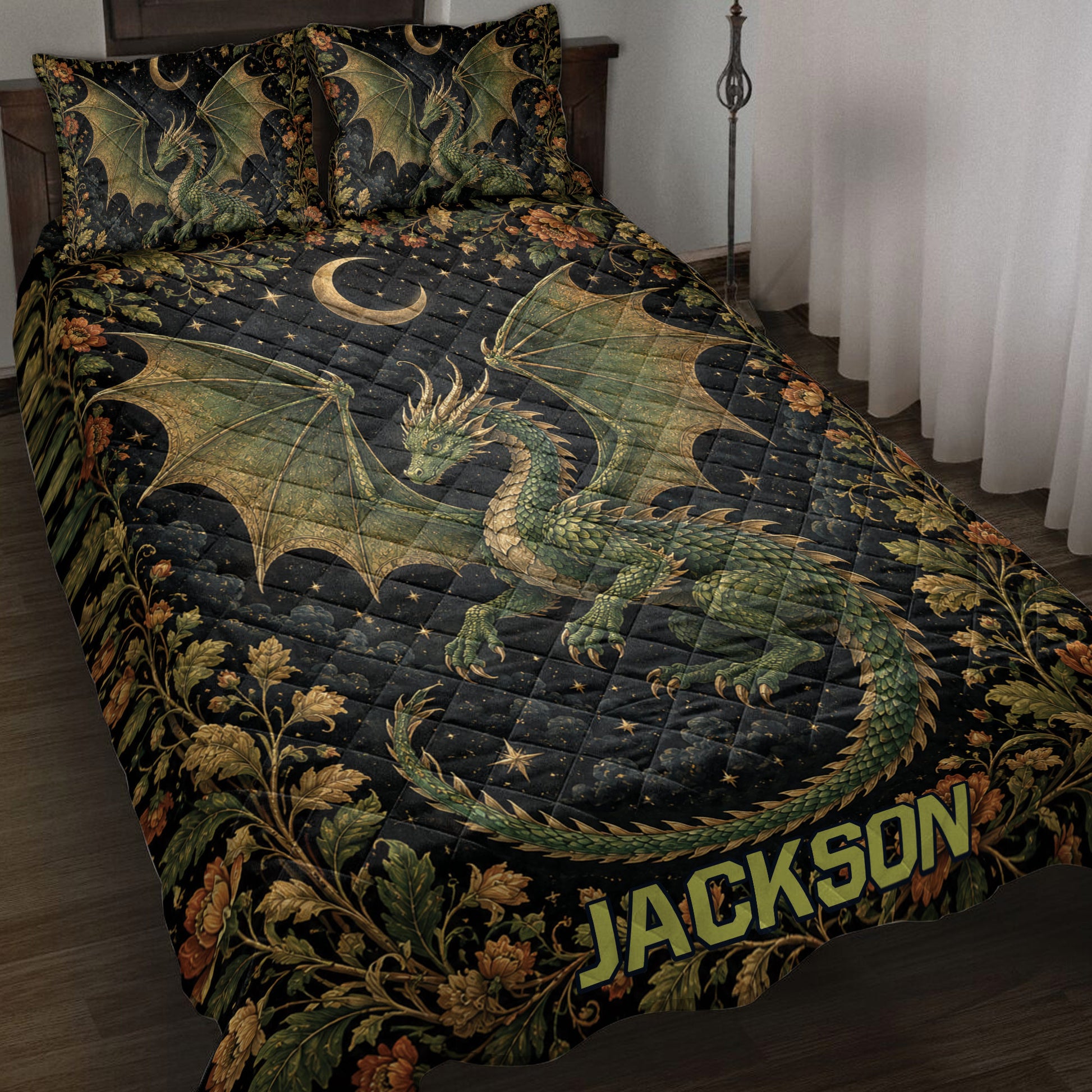 Dragon quilt blanket on a bed with green winged dragons, crescent moons, stars, and botanical florals