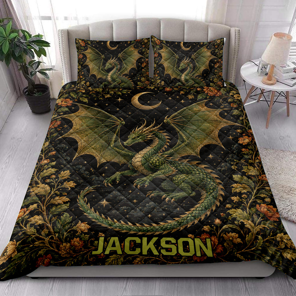 Dragon quilt blanket styled in a bright bedroom with green dragons, crescent moons, stars, and flowers