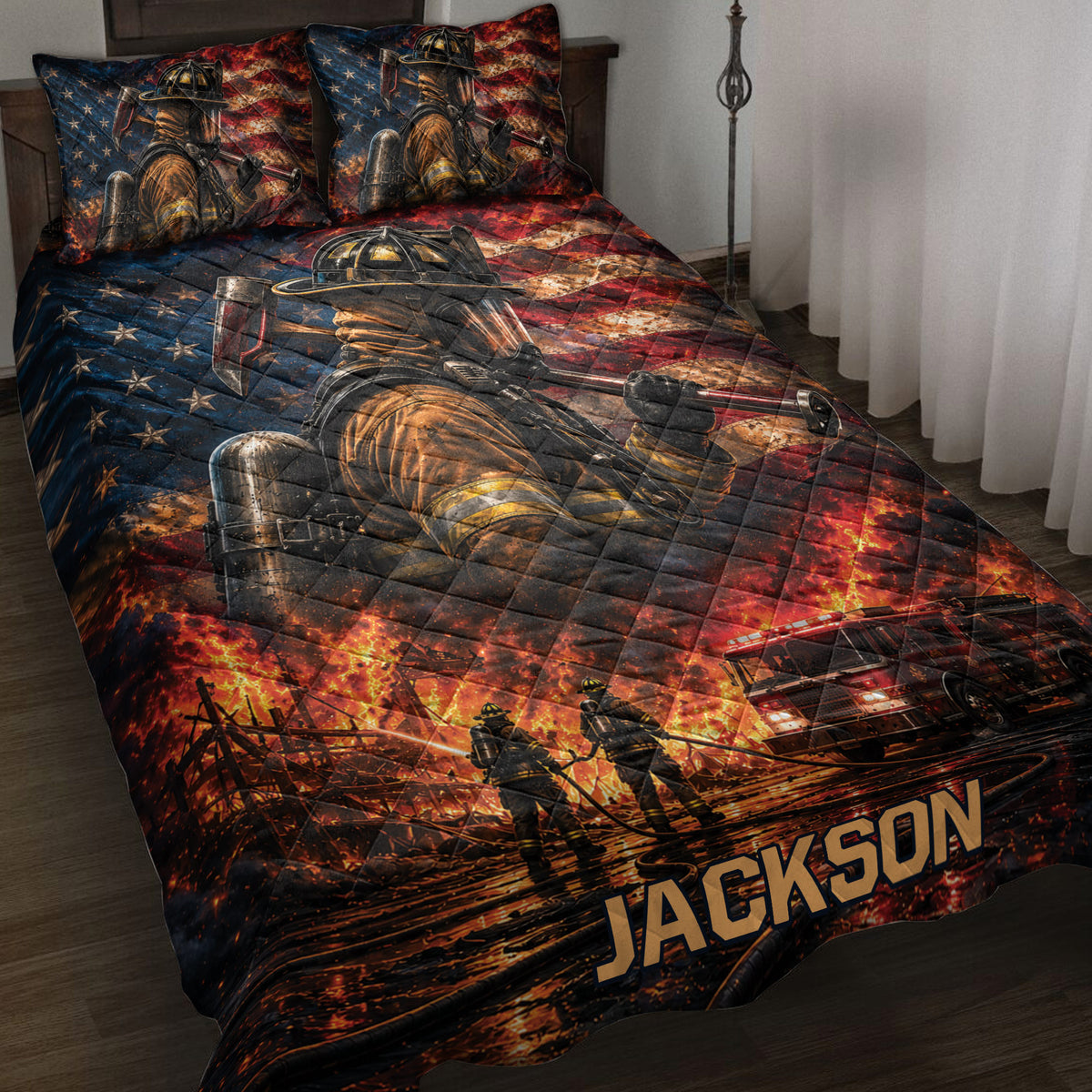 Firefighter quilt blanket displayed on a bed with fire scenes, fire truck artwork, and an American flag background