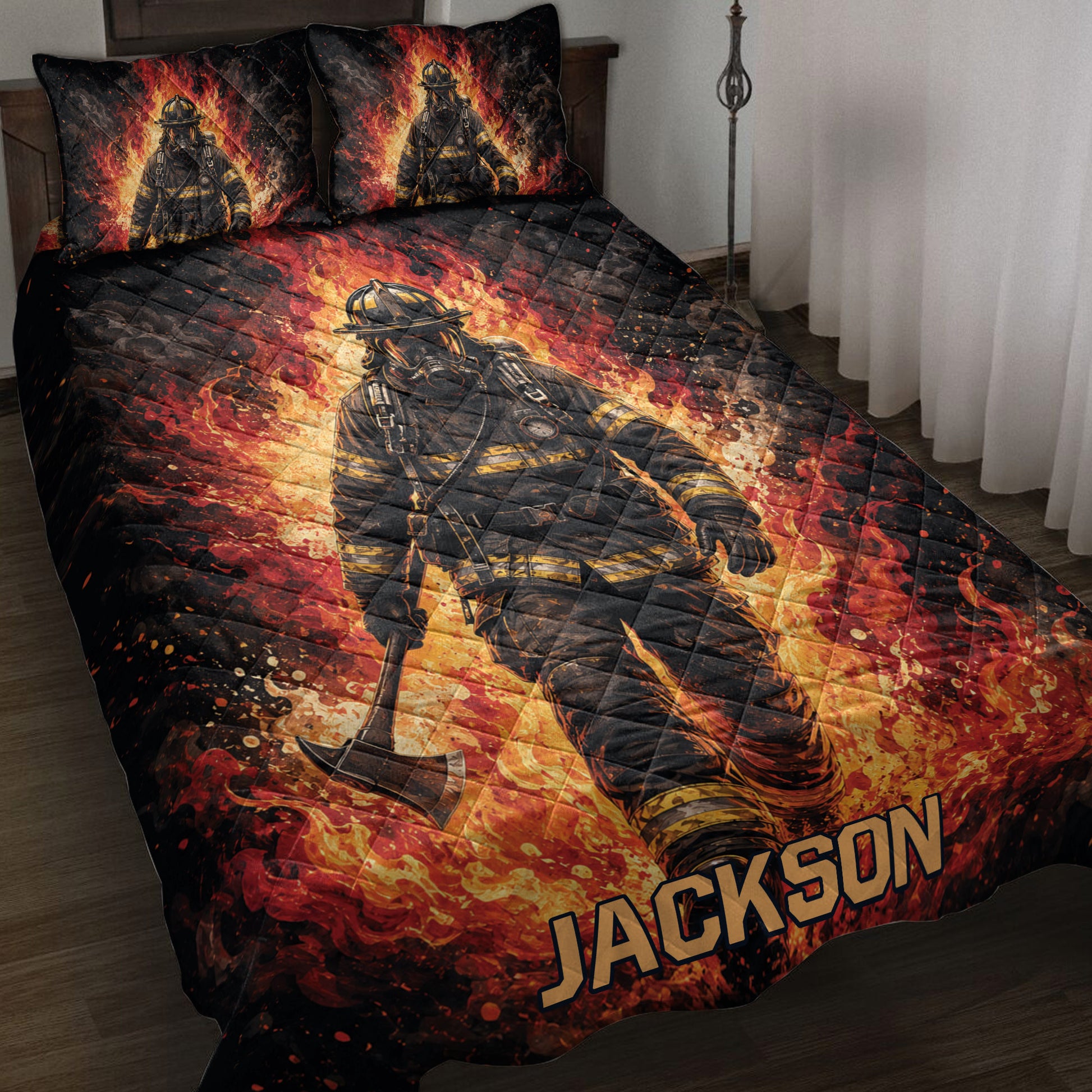 Firefighter quilt blanket displayed on a bed with dramatic flames, dark smoke, and bold red and gold artwork