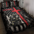 Firefighter quilt blanket displayed on a bed with smoky artwork, red graphic accents, stars, and first responder imagery