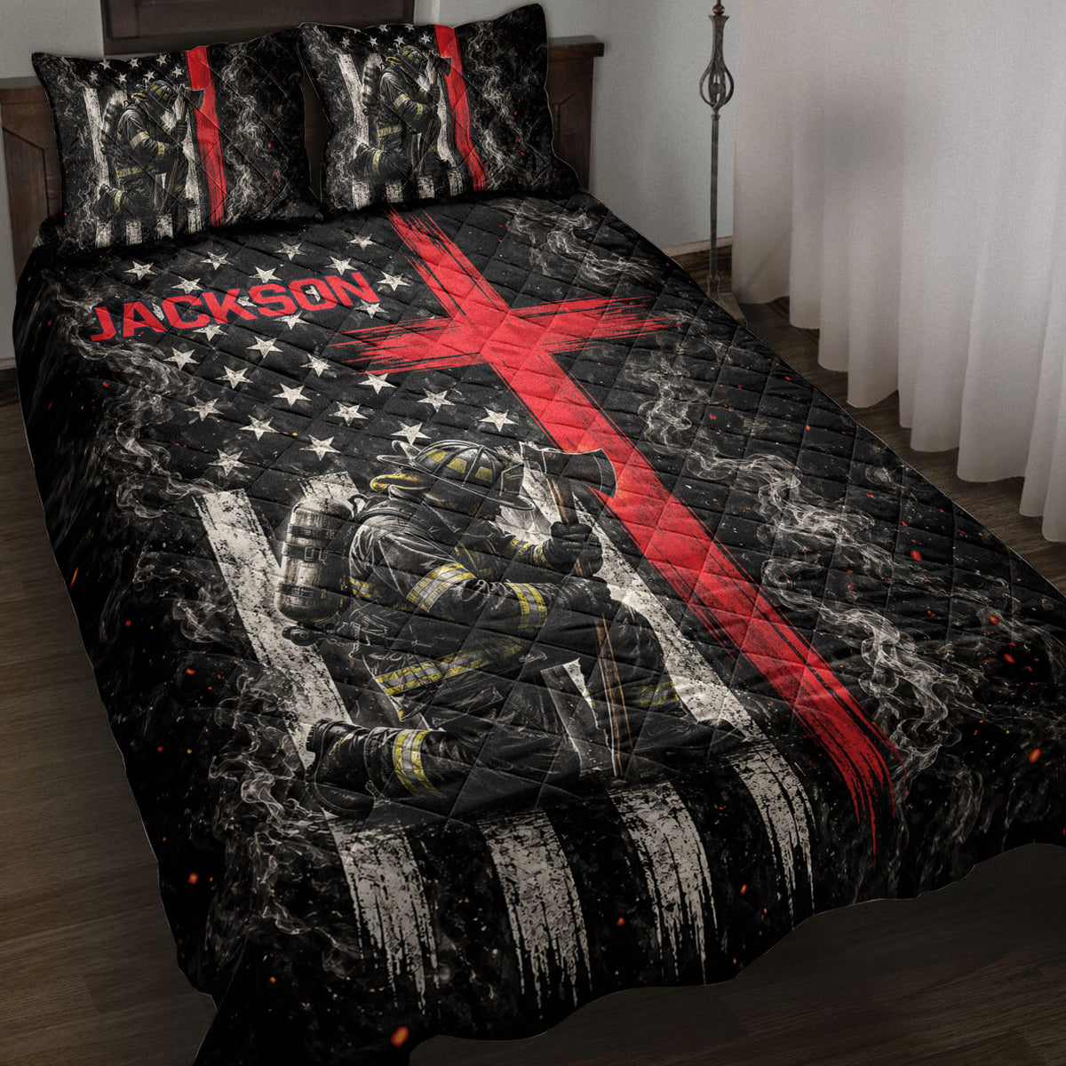 Firefighter quilt blanket displayed on a bed with smoky artwork, red graphic accents, stars, and first responder imagery