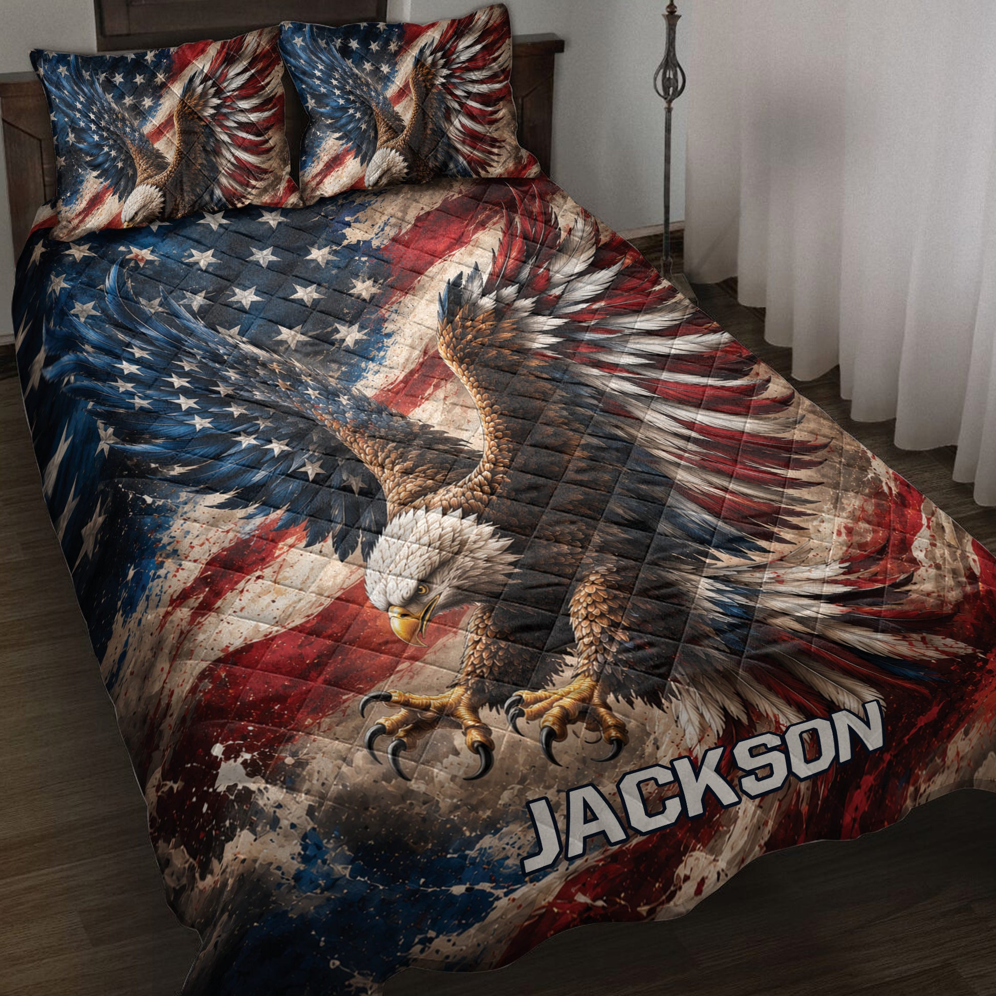 Eagle quilt blanket displayed on a bed with patriotic red, white, and blue wing artwork