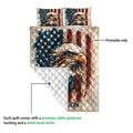 Eagle quilt showing the printed patriotic front and white quilted backing