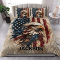 Patriotic eagle quilt blanket styled on a bedroom bed with coordinating eagle pillowcase designs