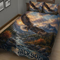 Close bedroom view of eagle quilt bedding with forest, mountain, and flowing river artwork