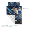 Eagle quilt blanket close-up showing the printed front and white diamond-stitched backing
