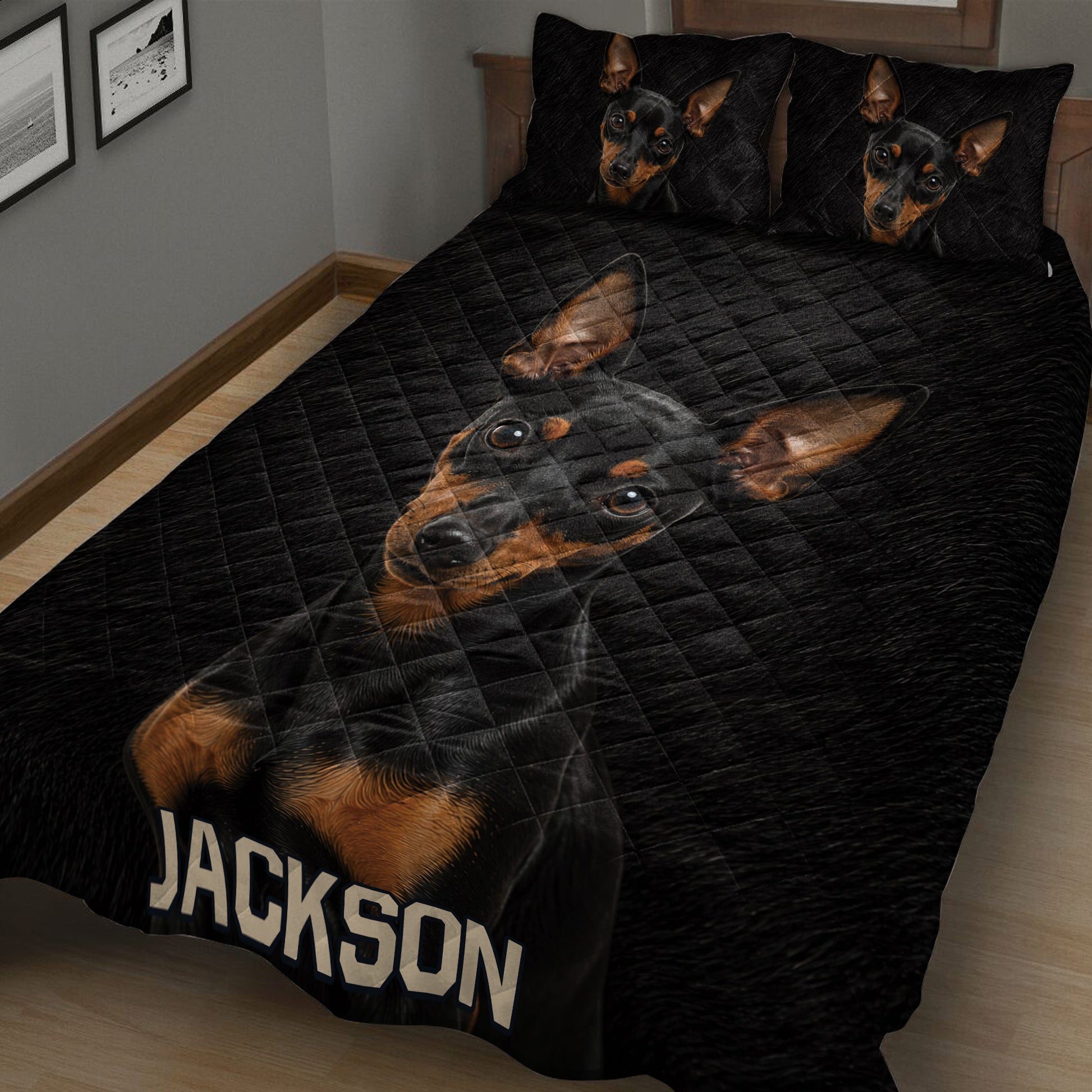 Close bedroom view of a black Miniature Pinscher quilt with matching dog portrait pillowcases