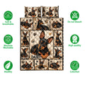 Miniature Pinscher quilt bedding design shown with repeated dog portraits, paw prints, hearts, and star accents