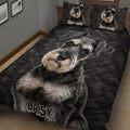 Miniature Schnauzer quilt blanket shown in a cozy bedroom with black and gray dog portrait design