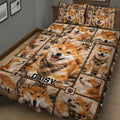 Close view of Shiba Inu quilt blanket artwork featuring sleeping and smiling dogs in warm brown tones