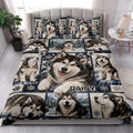 Alaskan Malamute quilt blanket styled across a bedroom with coordinated dog artwork and blue winter accents