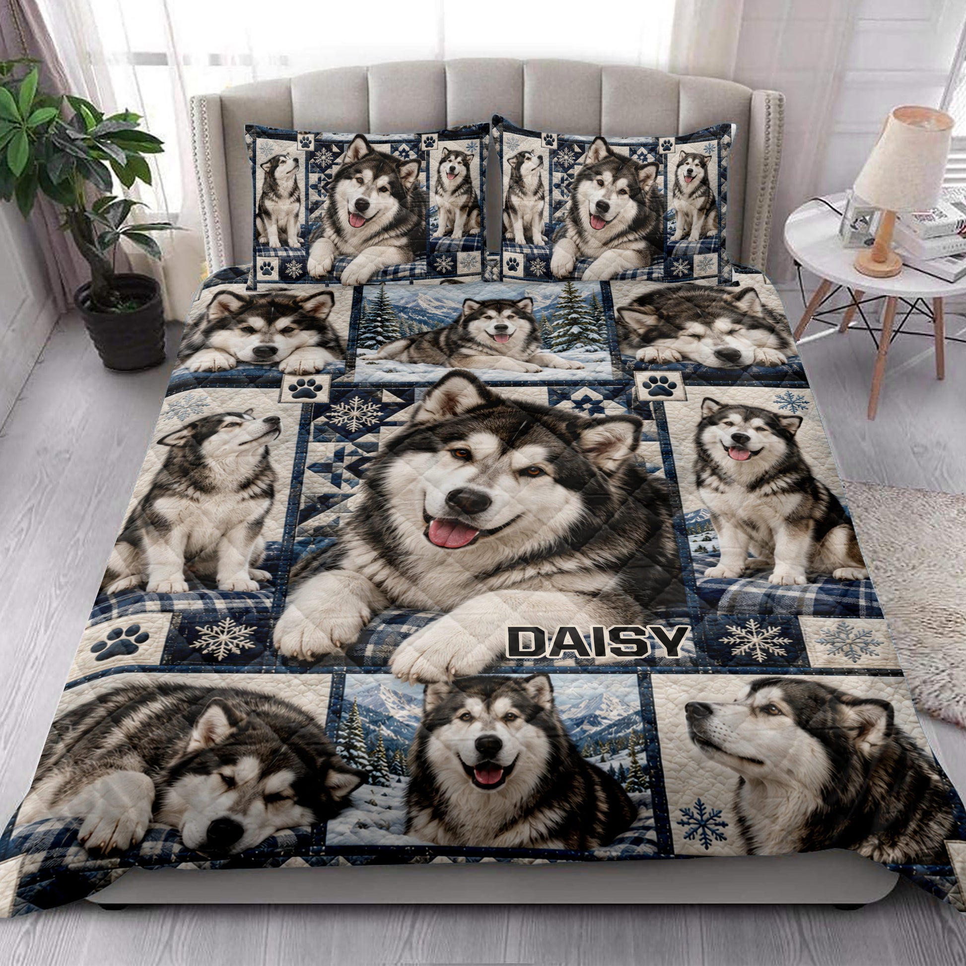 Alaskan Malamute quilt blanket styled across a bedroom with coordinated dog artwork and blue winter accents