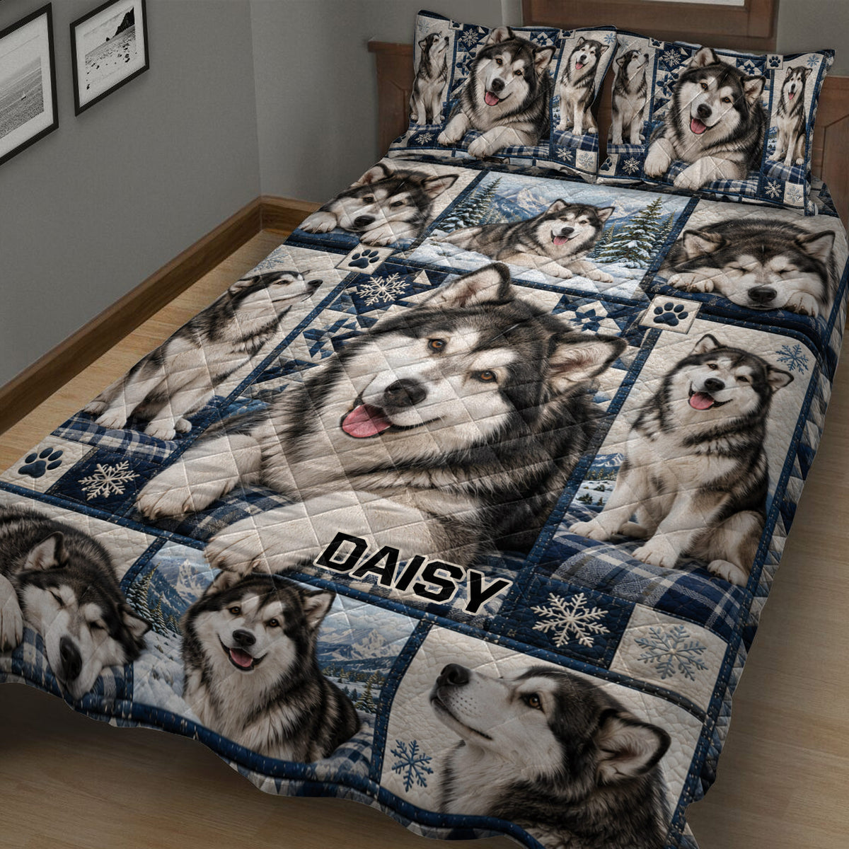 Alaskan Malamute quilt bedding displayed on a bed with snowy landscapes, paw prints, and plaid panels