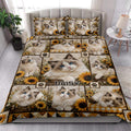 Ragdoll cat and sunflower quilt blanket styled in a bright bedroom with matching printed pillows