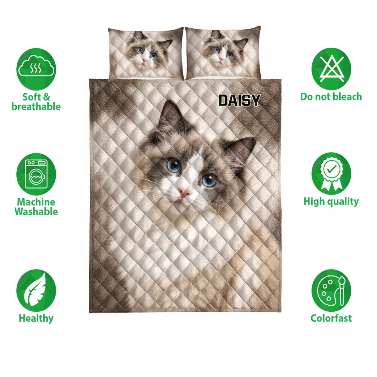 Ragdoll cat quilt bedding display with blue-eyed cat artwork, pillows, and neutral brown tones