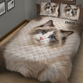Close bedroom view of Ragdoll cat quilt bedding with detailed feline artwork and neutral colors