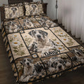 Great Dane quilt blanket displayed on a bed with daisies, plaid panels, and rustic black and tan artwork