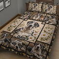 Close angled view of Great Dane quilt bedding with multiple dog portraits, daisies, and rustic plaid details