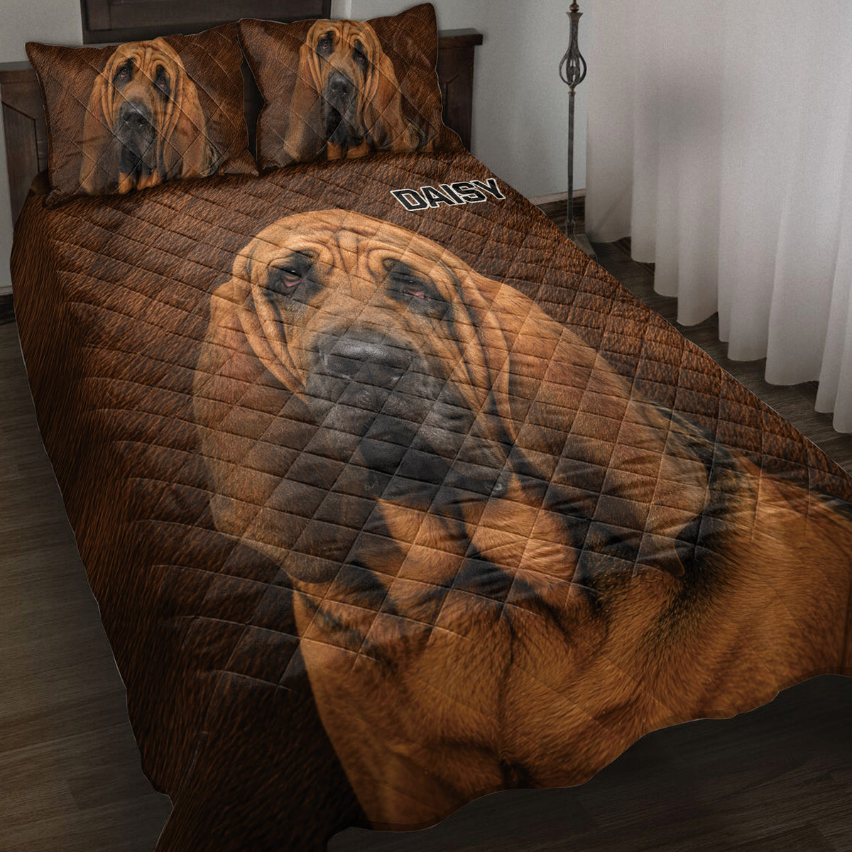 Bloodhound quilt blanket displayed on a bed with matching dog portrait pillow designs and rich brown tones