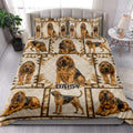 Bloodhound quilt bedding set styled on a bedroom bed with matching dog artwork