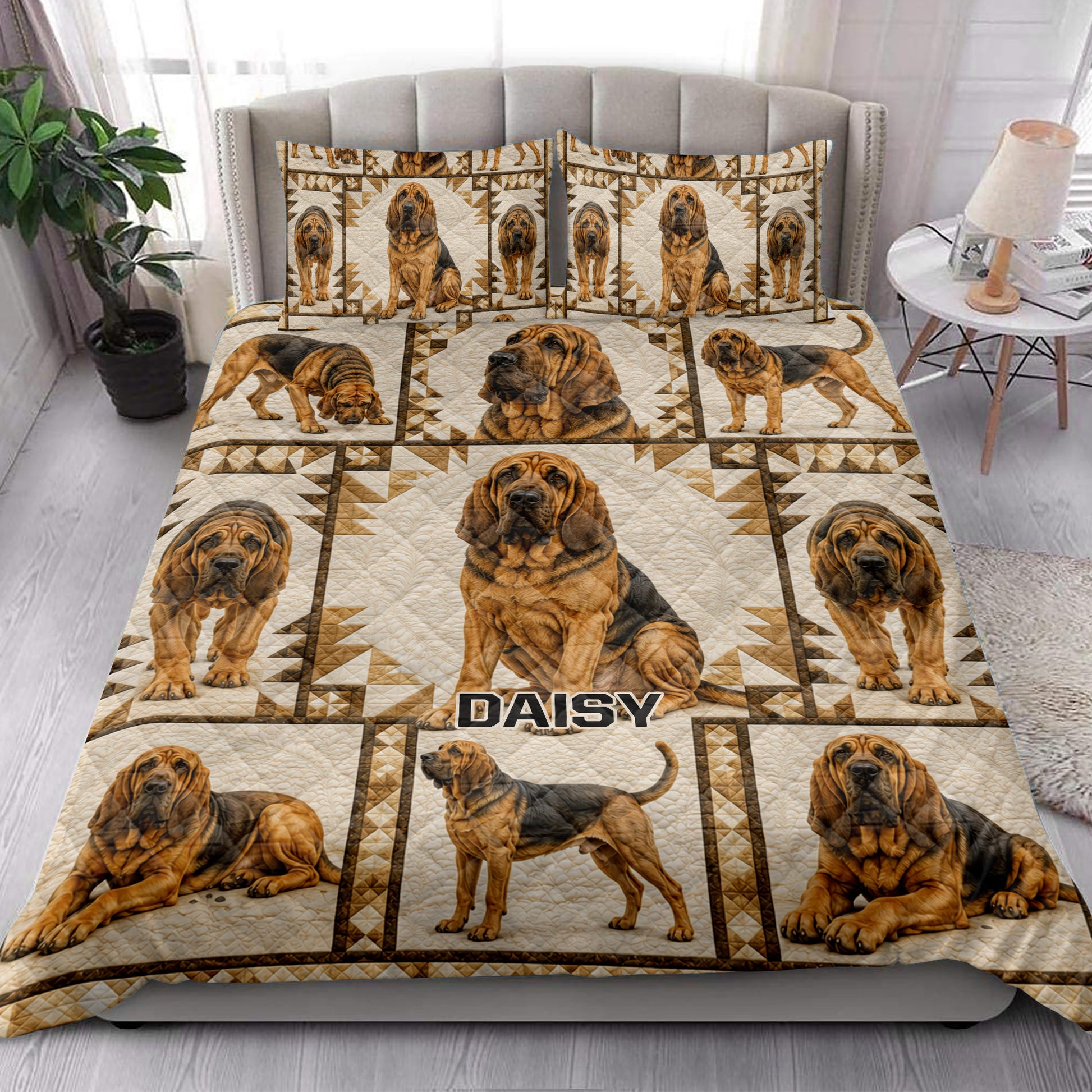 Bloodhound quilt bedding set styled on a bedroom bed with matching dog artwork