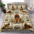 Bloodhound quilt blanket styled on a bedroom bed with matching daisy and hound artwork