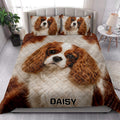 Cavalier King Charles Spaniel quilt blanket displayed in a bright bedroom with coordinating dog artwork